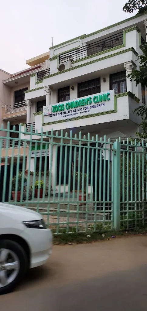 Zocis Children's Clinic street-facing signage above the entrance gate, DLF Phase IV.